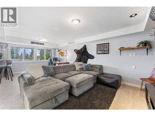 Huge rec room is bright with lots of options. - 3380 Mciver Road, West Kelowna, BC - Indoor Photo Showing Living Room