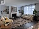 15 Prunella Crescent W, East Gwillimbury, ON  - Indoor Photo Showing Living Room With Fireplace 