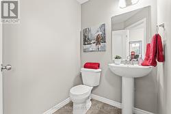 2 piece bathroom on main floor, in front hallway - 