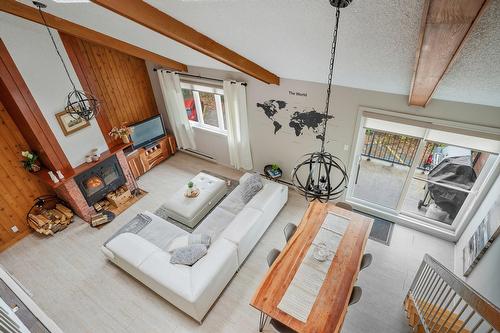 Overall view - 201-111 Av. Hochar, Saint-Sauveur, QC - Indoor Photo Showing Other Room With Fireplace