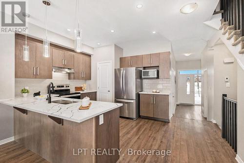 381 Cope Drive, Ottawa, ON - Indoor Photo Showing Kitchen With Stainless Steel Kitchen With Double Sink With Upgraded Kitchen