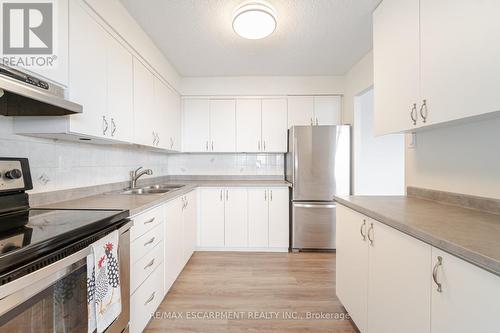 707 - 2301 Derry Road W, Mississauga, ON - Indoor Photo Showing Kitchen With Double Sink