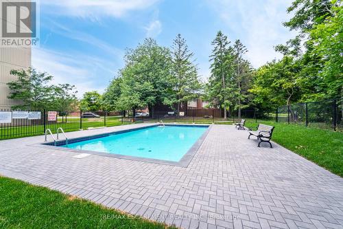 707 - 2301 Derry Road W, Mississauga, ON - Outdoor With In Ground Pool With Backyard