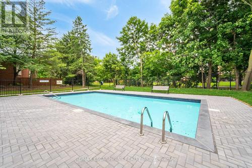 707 - 2301 Derry Road W, Mississauga, ON - Outdoor With In Ground Pool With Backyard
