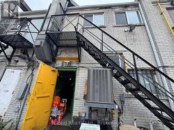 BACKSIDE ENTRANCE , SECOND FLOOR NOT PART OF LEASE - 