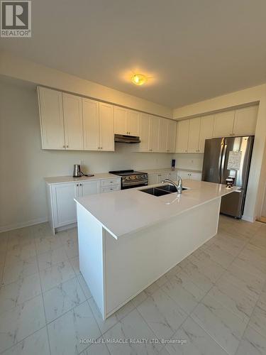 80 Golf Links Drive, Loyalist, ON - Indoor Photo Showing Kitchen With Double Sink