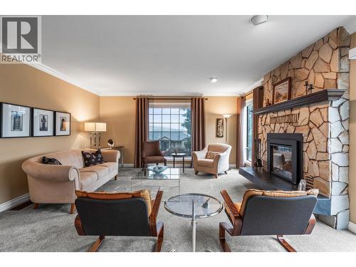 491 Terrace Drive, Coldstream, BC - Indoor Photo Showing Living Room With Fireplace