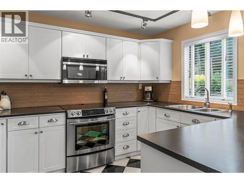 491 Terrace Drive, Coldstream, BC - Indoor Photo Showing Kitchen With Double Sink