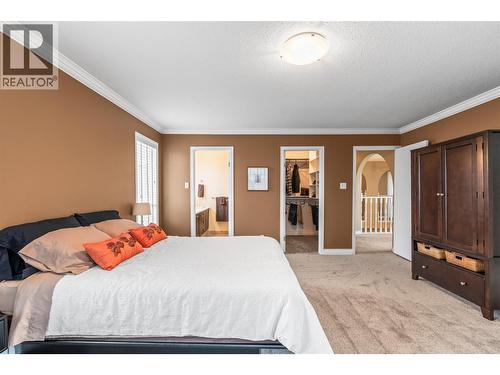 491 Terrace Drive, Coldstream, BC - Indoor Photo Showing Bedroom