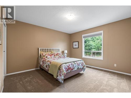 491 Terrace Drive, Coldstream, BC - Indoor Photo Showing Bedroom