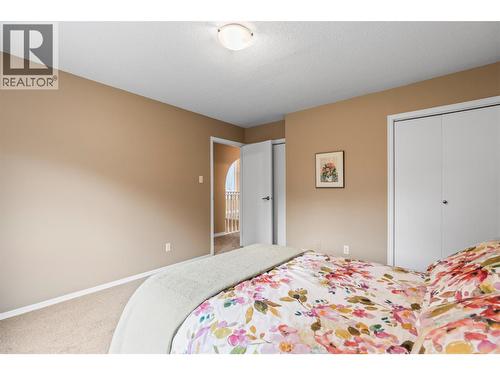 491 Terrace Drive, Coldstream, BC - Indoor Photo Showing Bedroom