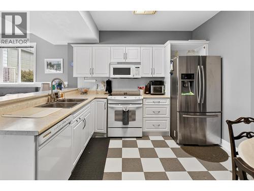 5168 Sandhills Drive, Kelowna, BC - Indoor Photo Showing Kitchen With Double Sink
