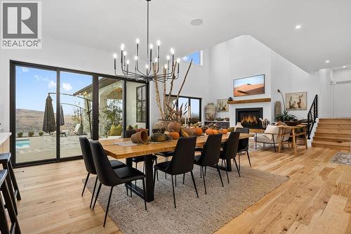 7236 L & A Road, Vernon, BC - Indoor Photo Showing Dining Room With Fireplace