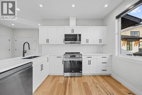 7236 L & A Road, Vernon, BC - Indoor Photo Showing Kitchen With Double Sink