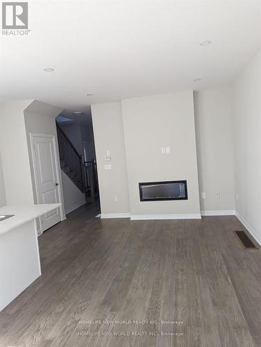 18 - 30 Mia Drive, Hamilton, ON - Indoor With Fireplace