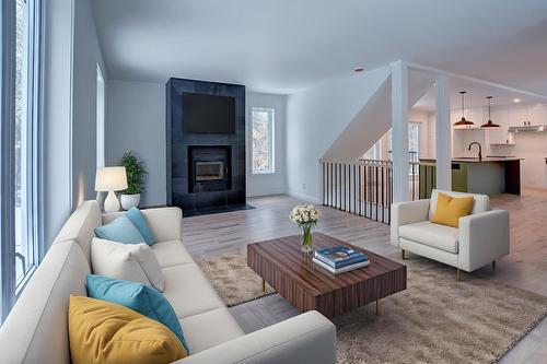 Salon - 184 Rue Lajeunesse, Saint-Colomban, QC - Indoor Photo Showing Living Room With Fireplace