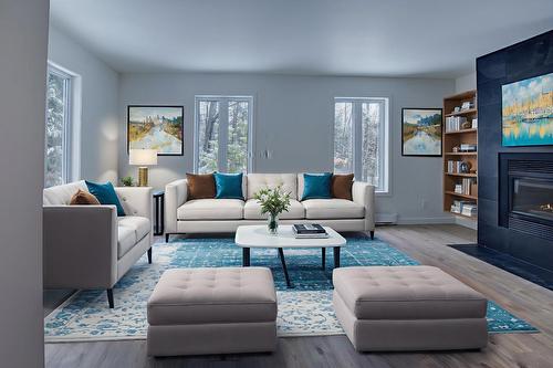Salon - 184 Rue Lajeunesse, Saint-Colomban, QC - Indoor Photo Showing Living Room With Fireplace