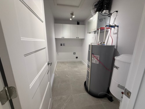 Salle de lavage - E-208 Rue St-Joseph, Sainte-Anne-Des-Plaines, QC - Indoor