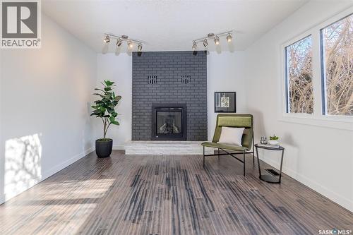 73 Red River Road, Saskatoon, SK - Indoor With Fireplace