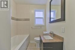 Main floor bathroom with soaker tub - 