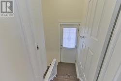 To basement, self-contained in-law suite, 2 exits - 
