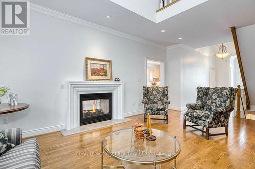 8 - 1205 Clarkson Road N, Mississauga, ON - Indoor Photo Showing Living Room With Fireplace