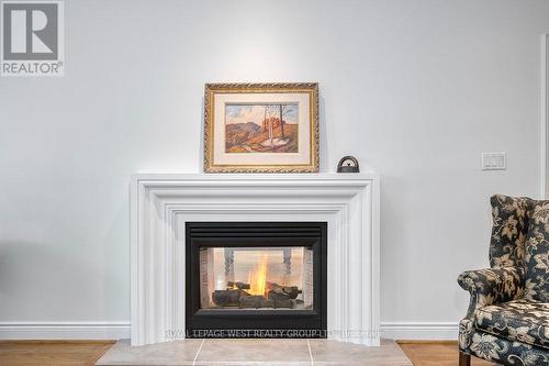 8 - 1205 Clarkson Road N, Mississauga, ON - Indoor Photo Showing Living Room With Fireplace