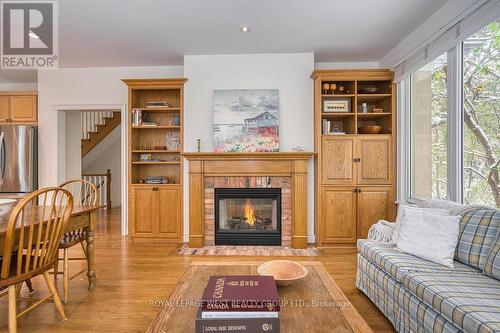 8 - 1205 Clarkson Road N, Mississauga, ON - Indoor Photo Showing Living Room With Fireplace