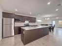 2 Dietrich Bay, Brandon, MB  - Indoor Photo Showing Kitchen With Double Sink With Upgraded Kitchen 