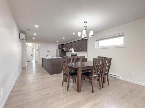 2 Dietrich Bay, Brandon, MB - Indoor Photo Showing Dining Room