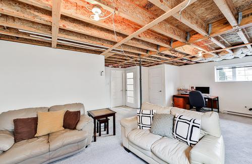 Family room - 10350 Rue Du Sauvignon, Mirabel, QC - Indoor Photo Showing Basement
