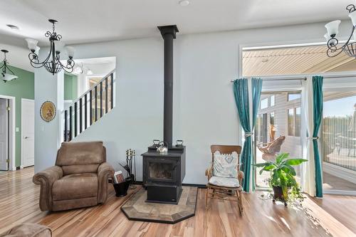 409 33Rd Avenue, Erickson, BC - Indoor Photo Showing Other Room With Fireplace