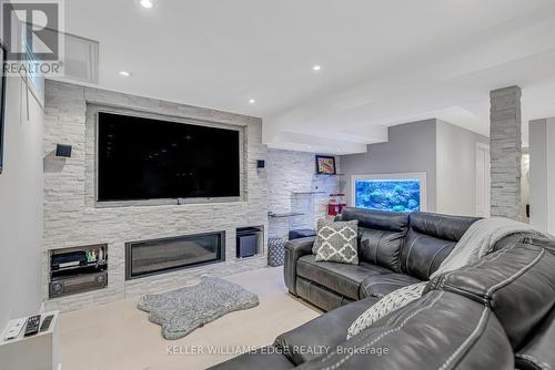 8 Keewaydin Street, Hamilton, ON - Indoor Photo Showing Living Room With Fireplace