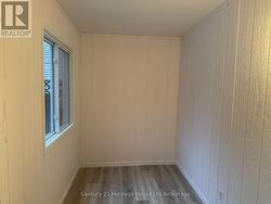 Enclosed front porch of ADU - 