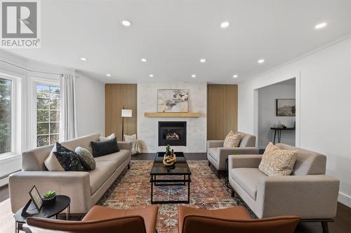 322 Tolt Road, St. Philips, NL - Indoor Photo Showing Living Room With Fireplace