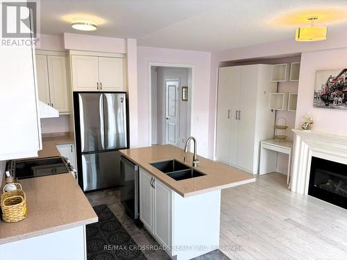 49 Memon Place, Markham, ON - Indoor Photo Showing Kitchen With Fireplace With Stainless Steel Kitchen With Double Sink
