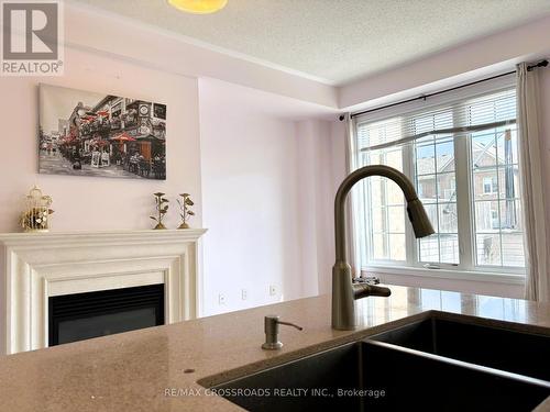 49 Memon Place, Markham, ON - Indoor Photo Showing Kitchen With Fireplace With Double Sink