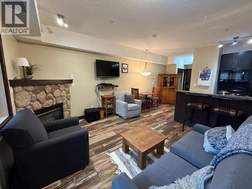 1500 Mcdonald Avenue Unit# 120, Fernie, BC - Indoor Photo Showing Living Room With Fireplace