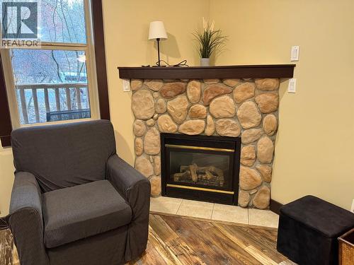 1500 Mcdonald Avenue Unit# 120, Fernie, BC - Indoor Photo Showing Living Room With Fireplace
