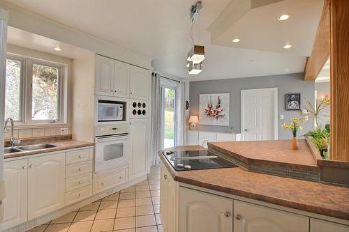 Cuisine - 1805 Boul. Malcolm-Fraser, La Malbaie, QC - Indoor Photo Showing Kitchen With Double Sink