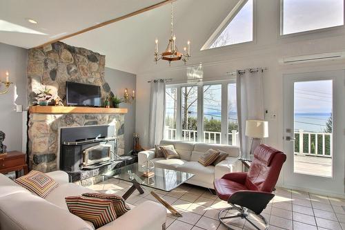 Salon - 1805 Boul. Malcolm-Fraser, La Malbaie, QC - Indoor Photo Showing Living Room With Fireplace