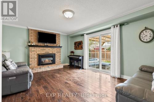 2203 Hunt Crescent, Burlington, ON - Indoor Photo Showing Living Room With Fireplace