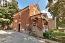 View of property exterior with brick siding and covered porch - 50 Walnut Street, Kitchener, ON  - Outdoor With Exterior 