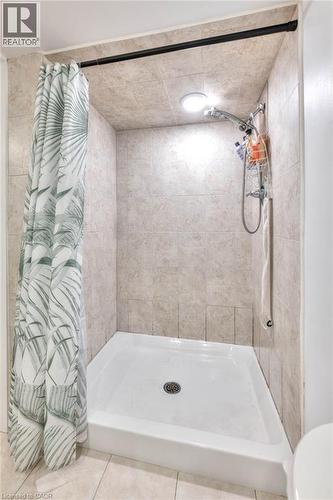 Full bath with a shower stall and tile patterned flooring - 50 Walnut Street, Kitchener, ON - Indoor Photo Showing Bathroom