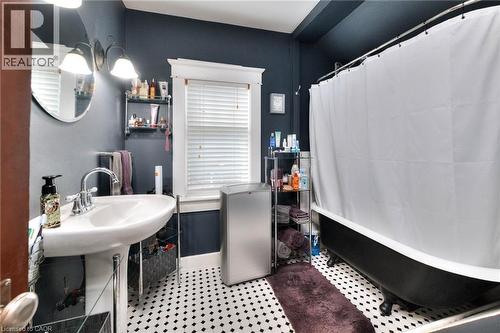 Bathroom with tile patterned flooring and baseboards - 50 Walnut Street, Kitchener, ON - Indoor Photo Showing Bathroom