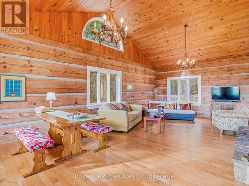 160 14 Concession W, Tiny, ON - Indoor Photo Showing Living Room With Fireplace