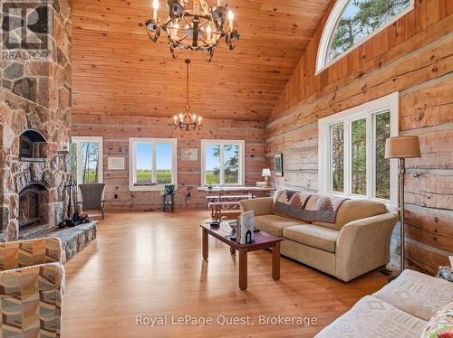 160 14 Concession W, Tiny, ON - Indoor Photo Showing Living Room With Fireplace