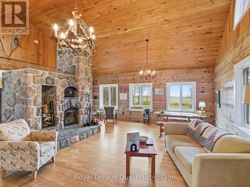 160 14 Concession W, Tiny, ON - Indoor Photo Showing Living Room With Fireplace