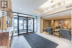 Common area with floor to ceiling windows and recessed lighting - 