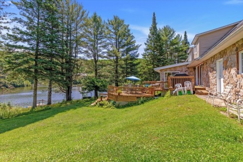 Face arrière - 925 Ch. Du Lac, Saint-Sauveur, QC - Outdoor With Deck Patio Veranda